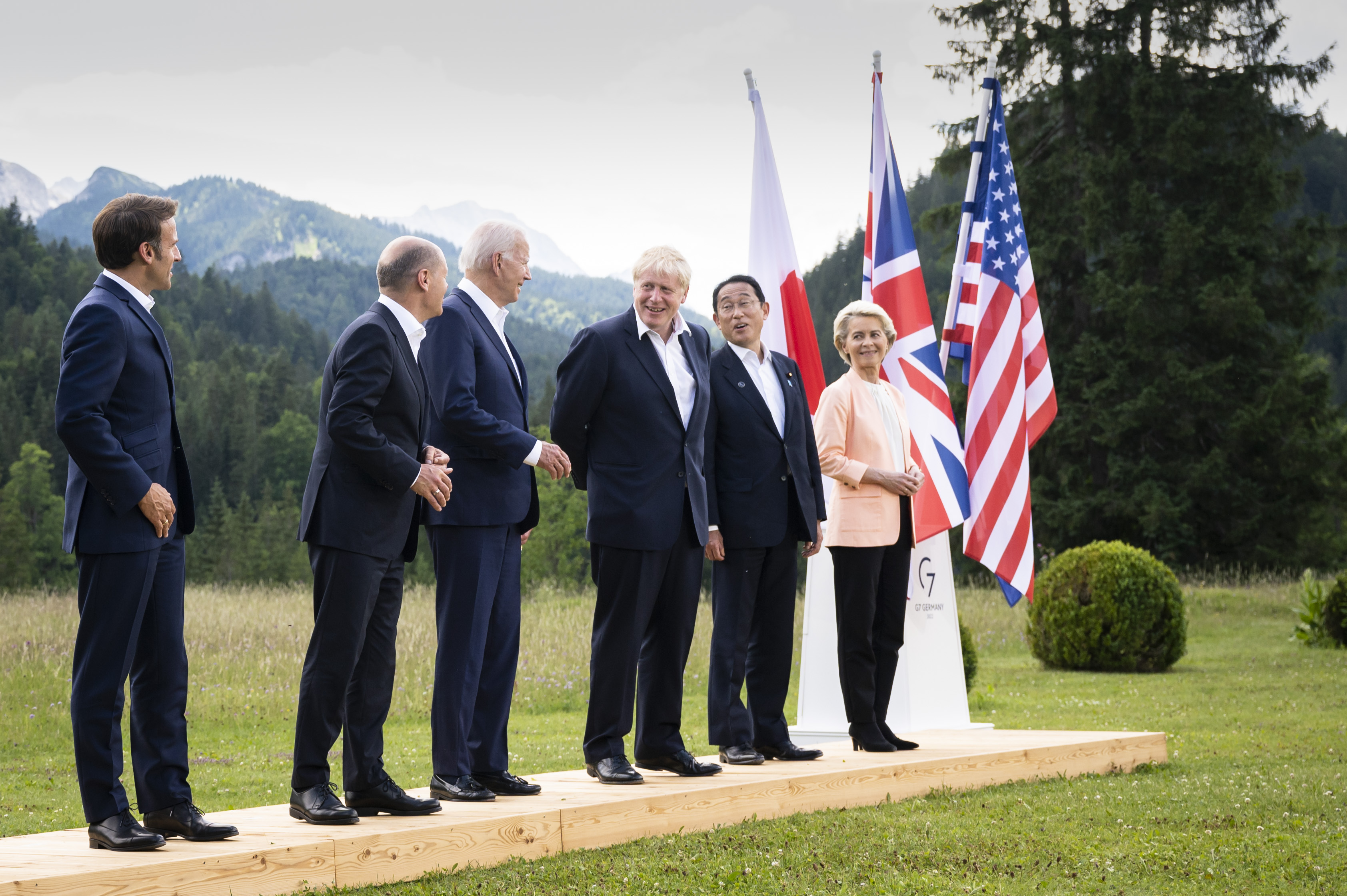 G7 participants wait for the family photo to be taken.