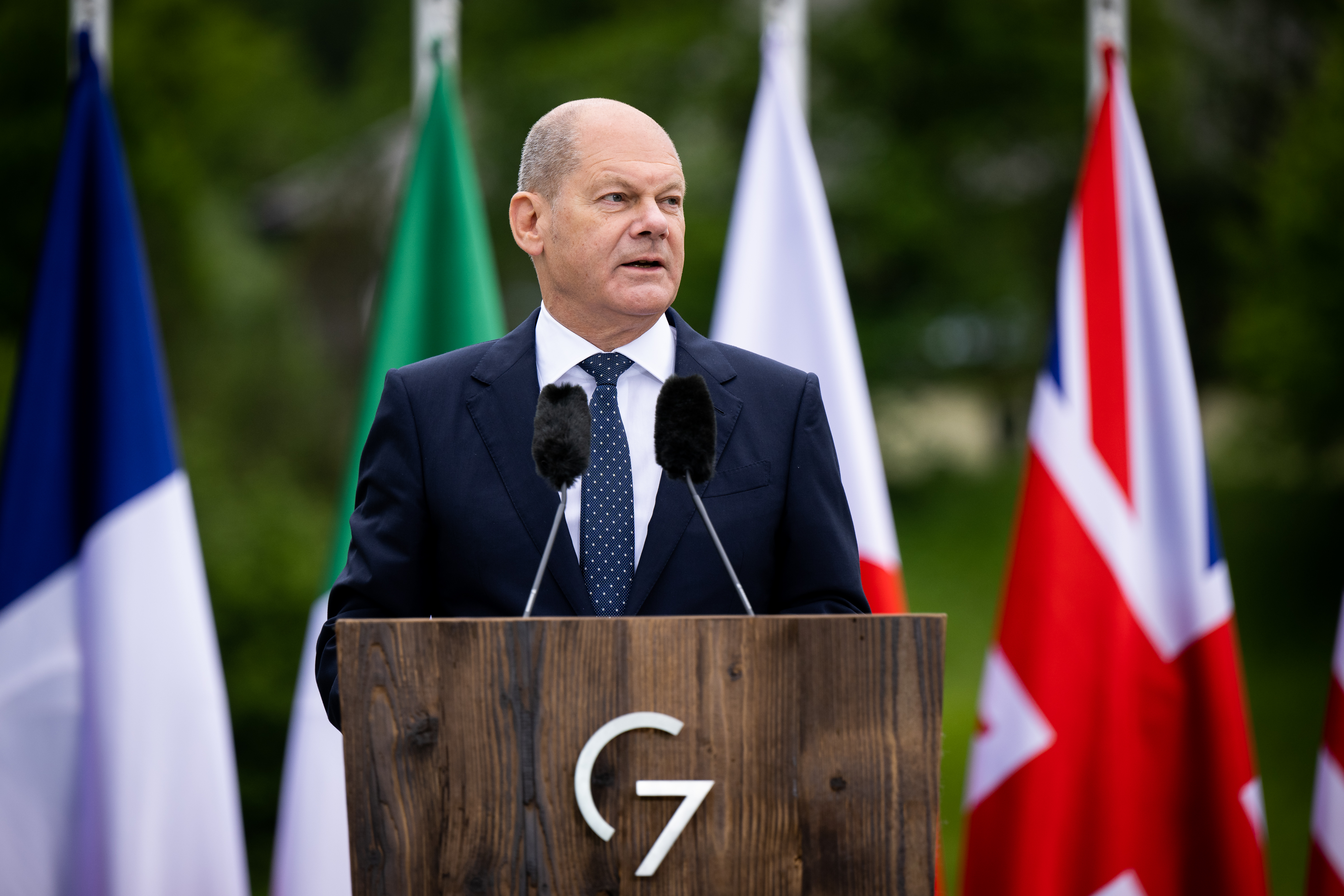 Federal Chancellor Olaf Scholz speaking to media representatives during his closing press conference at the G7 summit.