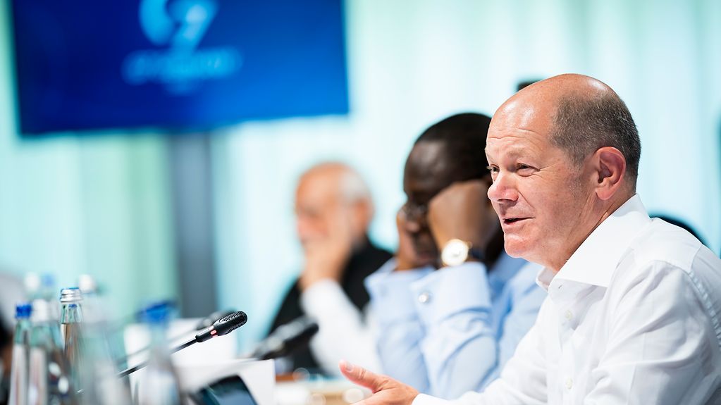 Federal Chancellor Olaf Scholz speaking at the start of the fifth working session, which was attended by the G7 heads of state and government, partner countries and representatives of international organisations.