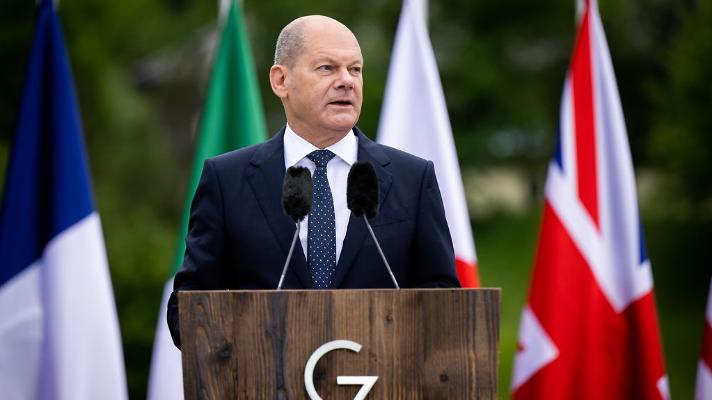 Federal Chancellor Olaf Scholz speaking to media representatives during his closing press conference at the G7 summit.