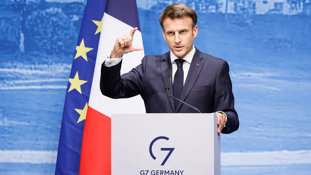 French President Emmanuel Macron gives a press conference at the end of the G7 summit.